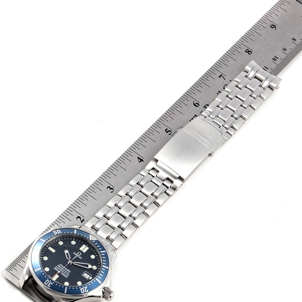 The image shows an Omega Seamaster 2531.80.00 Men
s Stainless Steel Blue Dial 2531.80.00 Men
s Stainless Steel Blue Dial watch laid flat with its face and metal bracelet visible, measured alongside a ruler.