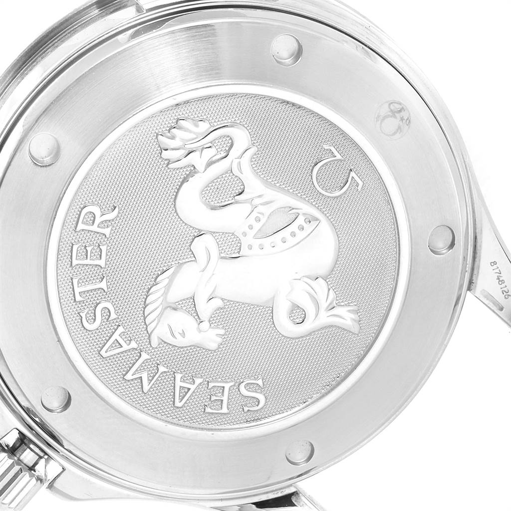 The image shows the back case of an Omega Seamaster 2220.80.00 Men
s Stainless Steel Blue Dial 2220.80.00 Men
s Stainless Steel Blue Dial watch, featuring the Seamaster emblem and some surrounding screws.