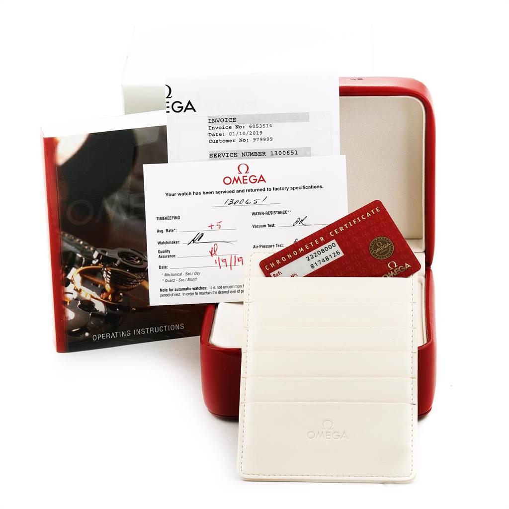 This image shows Omega Seamaster 2220.80.00 Men
s Stainless Steel Blue Dial 2220.80.00 Men
s Stainless Steel Blue Dial watch accessories including a red box, documentation, and a chronometer certificate card.