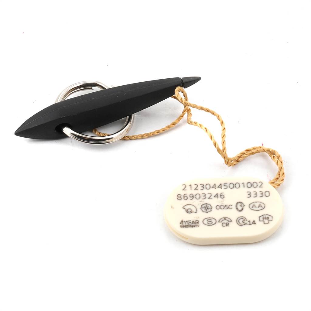 The image shows a tag and accessories for an Omega Seamaster 212.30.44.50.01.002 Men
s Stainless Steel Black Dial 212.30.44.50.01.002 Men
s Stainless Steel Black Dial watch, including a black plastic tool and a label with reference numbers.