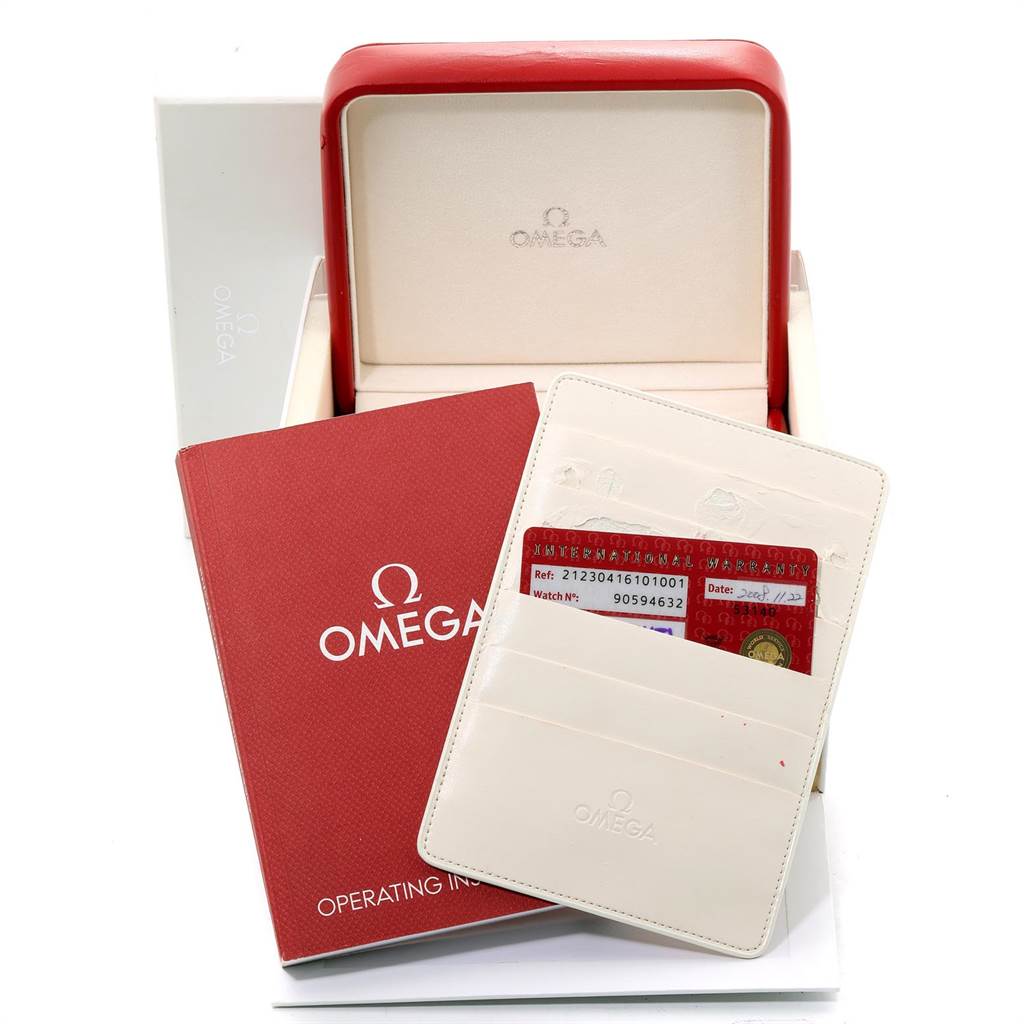 The image shows the Omega Seamaster 2221.80.00 Men
s Stainless Steel Blue Dial 2221.80.00 Men
s Stainless Steel Blue Dial watch box, an operating instruction booklet, and a warranty card holder.