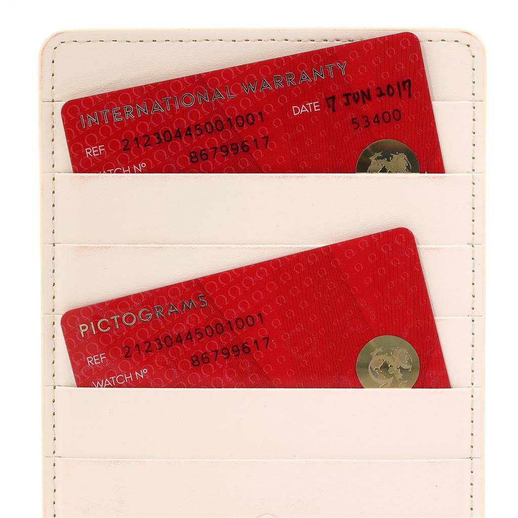 The image shows international warranty and pictograms cards for the Omega Seamaster 212.30.44.50.01.001 Men
s Stainless Steel Black Dial 212.30.44.50.01.001 Men
s Stainless Steel Black Dial watch, placed in a white cardholder.