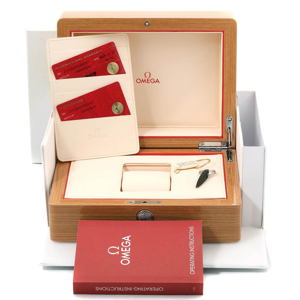 The image shows the Omega Seamaster 212.30.44.50.03.001 Men
s Stainless Steel Blue Dial 212.30.44.50.03.001 Men
s Stainless Steel Blue Dial watch packaging, including the box, warranty cards, and operating instructions.