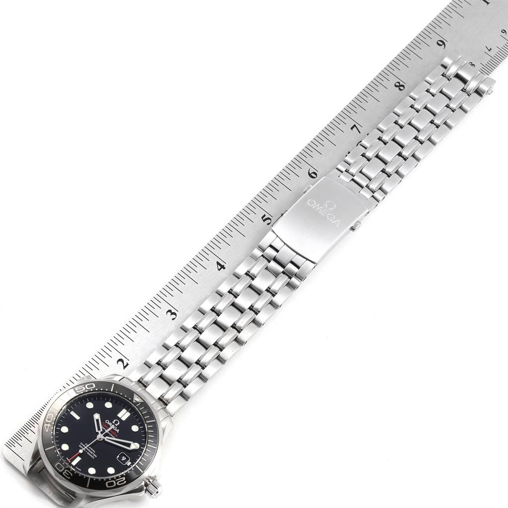 The image shows an Omega Seamaster 212.30.41.20.01.003 Men
s Stainless Steel Black Dial 212.30.41.20.01.003 Men
s Stainless Steel Black Dial watch laid flat with a ruler, displaying the watch face and bracelet.