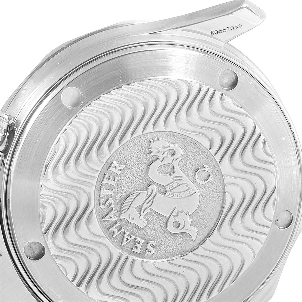 The image shows the back case of an Omega Seamaster 2252.50.00 Men
s Stainless Steel Black Dial 2252.50.00 Men
s Stainless Steel Black Dial watch, highlighting its engraved logo and wavy design.