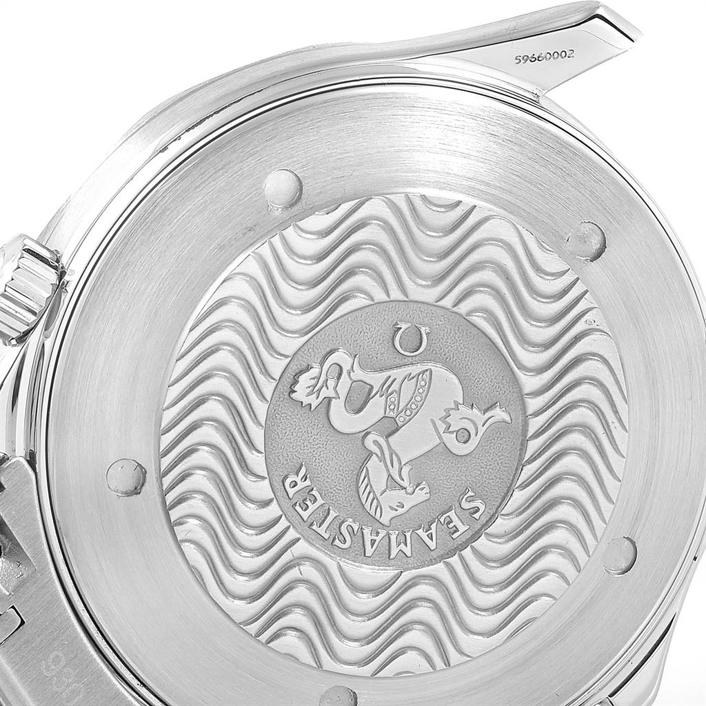 This image shows a close-up of the Omega Seamaster 2265.80.00 Men
s Stainless Steel Blue Dial 2265.80.00 Men
s Stainless Steel Blue Dial
s engraved case back with wave patterns and the logo.