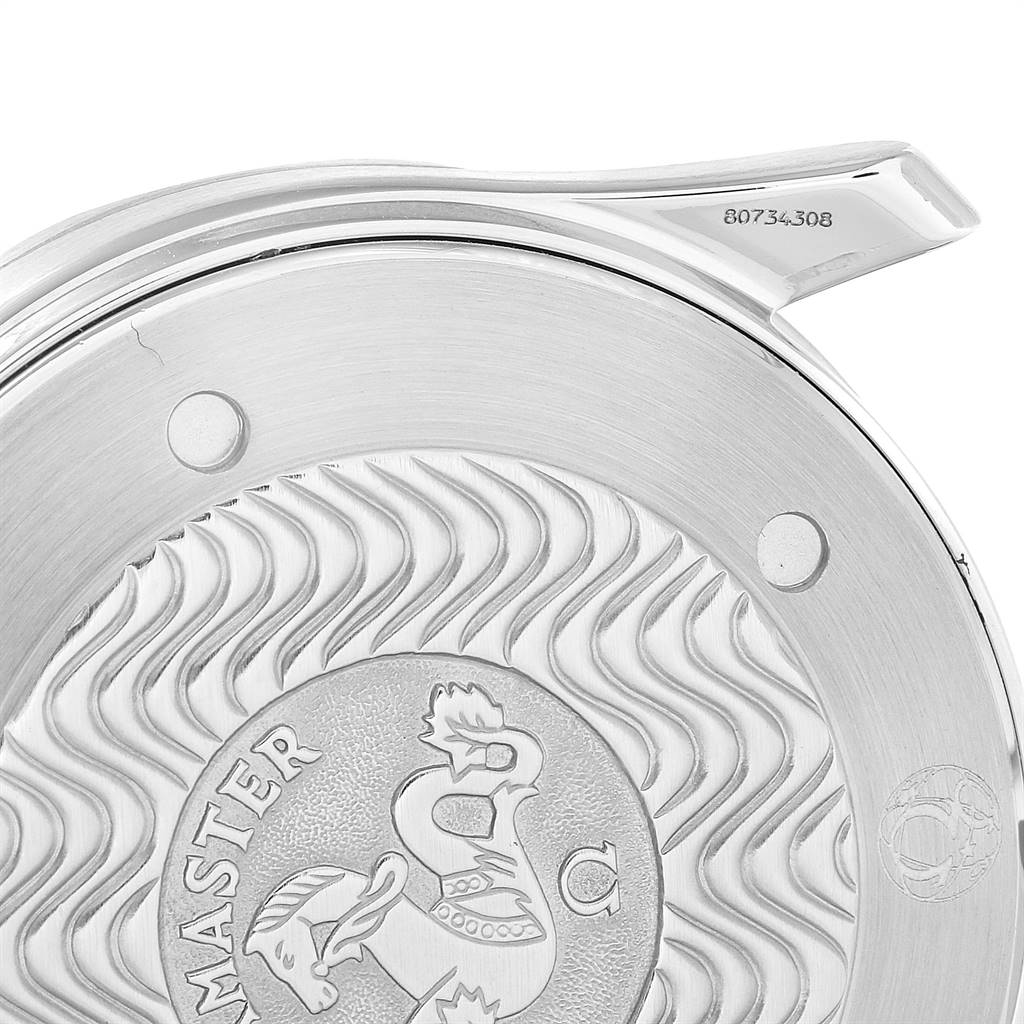 This close-up image shows the back case of an Omega Seamaster 2531.80.00 Men
s Stainless Steel Blue Dial 2531.80.00 Men
s Stainless Steel Blue Dial watch, featuring its engraved design and part of the bracelet attachment.