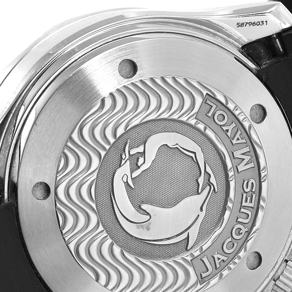 This image shows the backside of the Omega Seamaster 2595.30.00 Men
s Stainless Steel Silver Dial 2595.30.00 Men
s Stainless Steel Silver Dial watch, featuring an engraved design and a visible serial number.