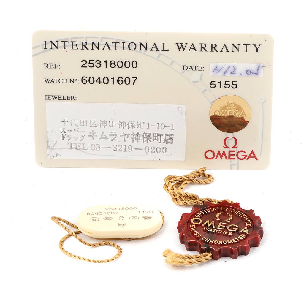 The image shows the international warranty card and tags for an Omega Seamaster 2531.80.00 Men
s Stainless Steel Blue Dial 2531.80.00 Men
s Stainless Steel Blue Dial watch.