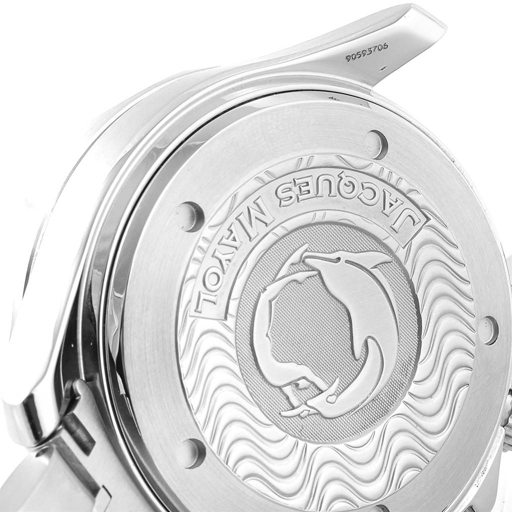 The image shows the engraved case back of an Omega Seamaster 2595.50.00 Men
s Stainless Steel Black Dial 2595.50.00 Men
s Stainless Steel Black Dial watch, viewed at an angle displaying the embossed logo and wave pattern.