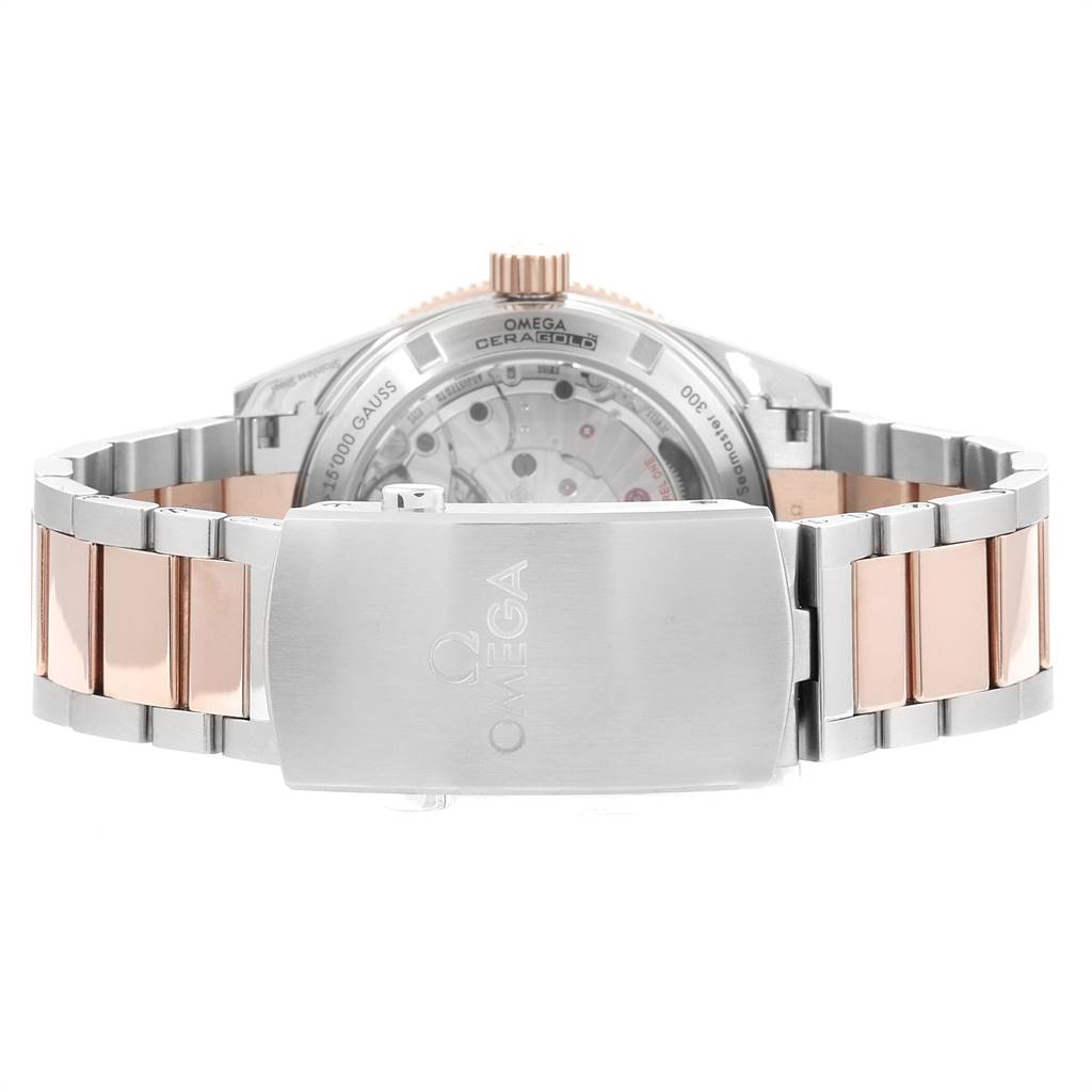 The image shows the back view of an Omega Seamaster 233.20.41.21.01.001 Men's Steel and Gold (two tone) Black Dial 233.20.41.21.01.001 Men's Steel and Gold (two tone) Black Dial, focusing on its two-tone bracelet and clasp.