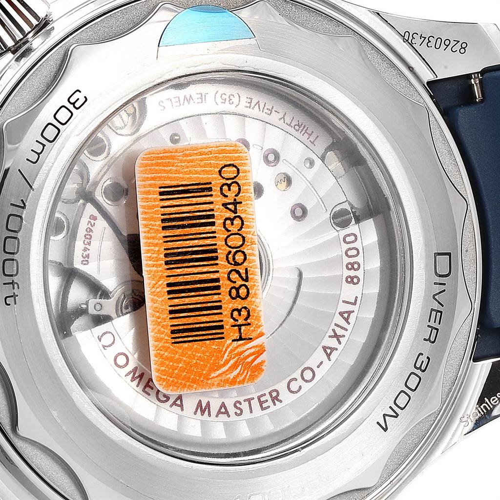 The image shows the back of an Omega Seamaster 210.32.42.20.06.001 Men's Stainless Steel Grey Dial 210.32.42.20.06.001 Men's Stainless Steel Grey Dial model, highlighting its open caseback and internal mechanisms.