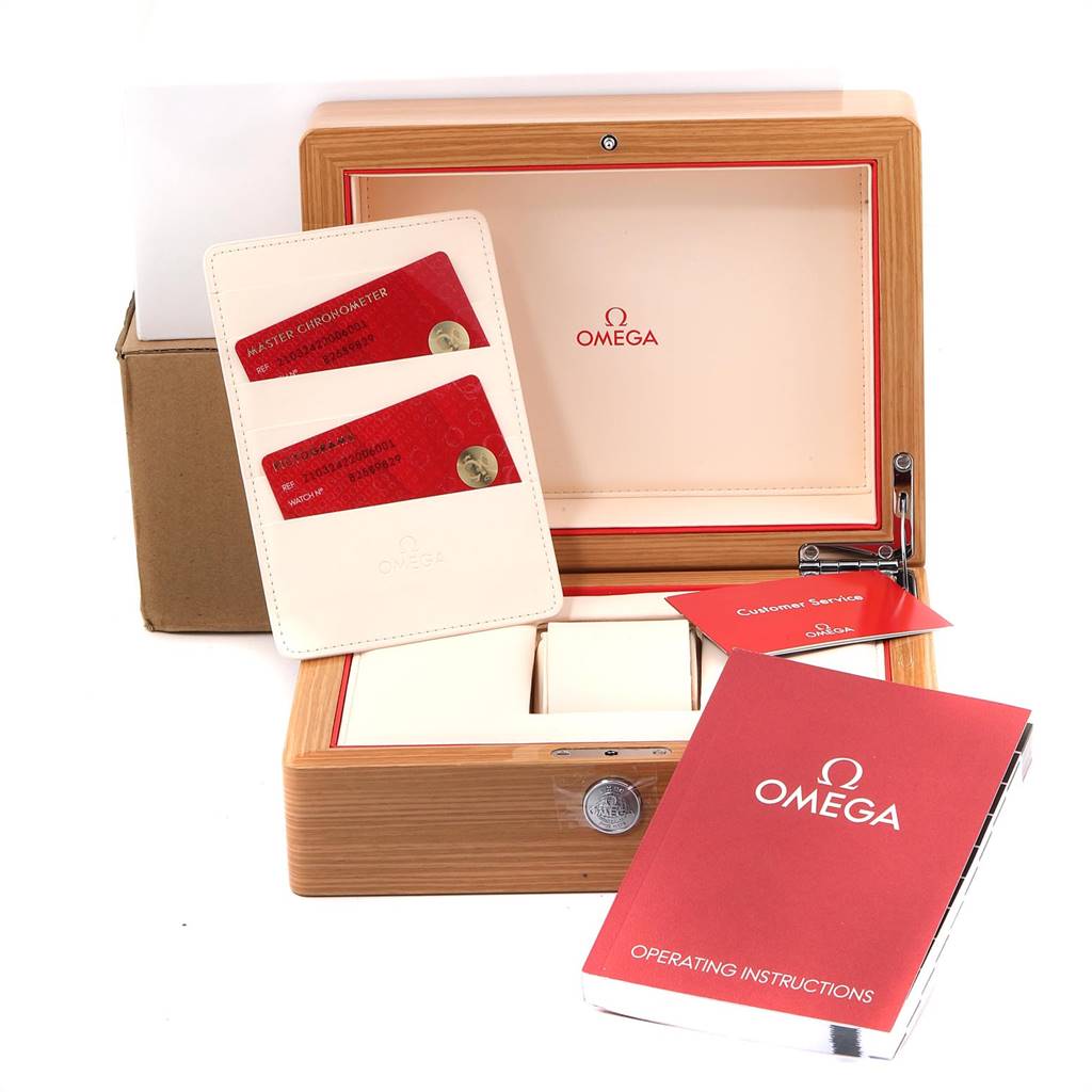 The image shows an open Omega Seamaster 210.32.42.20.06.001 Stainless Steel Grey Dial 210.32.42.20.06.001 Stainless Steel Grey Dial watch box with customer service booklet, operating instructions, and warranty cards.