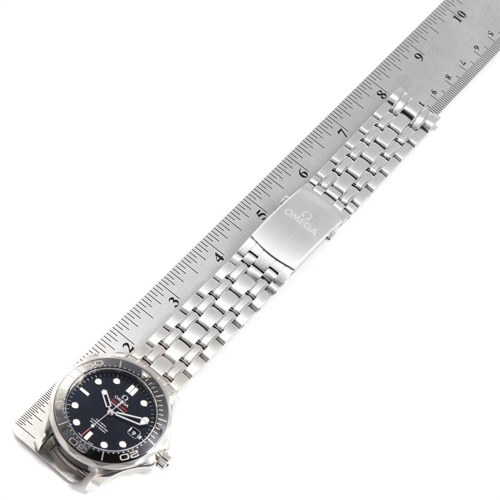 The image shows an Omega Seamaster 212.30.41.20.01.003 Men
s Stainless Steel Black Dial 212.30.41.20.01.003 Men
s Stainless Steel Black Dial watch laid flat with its stainless steel bracelet extended alongside a ruler for scale.