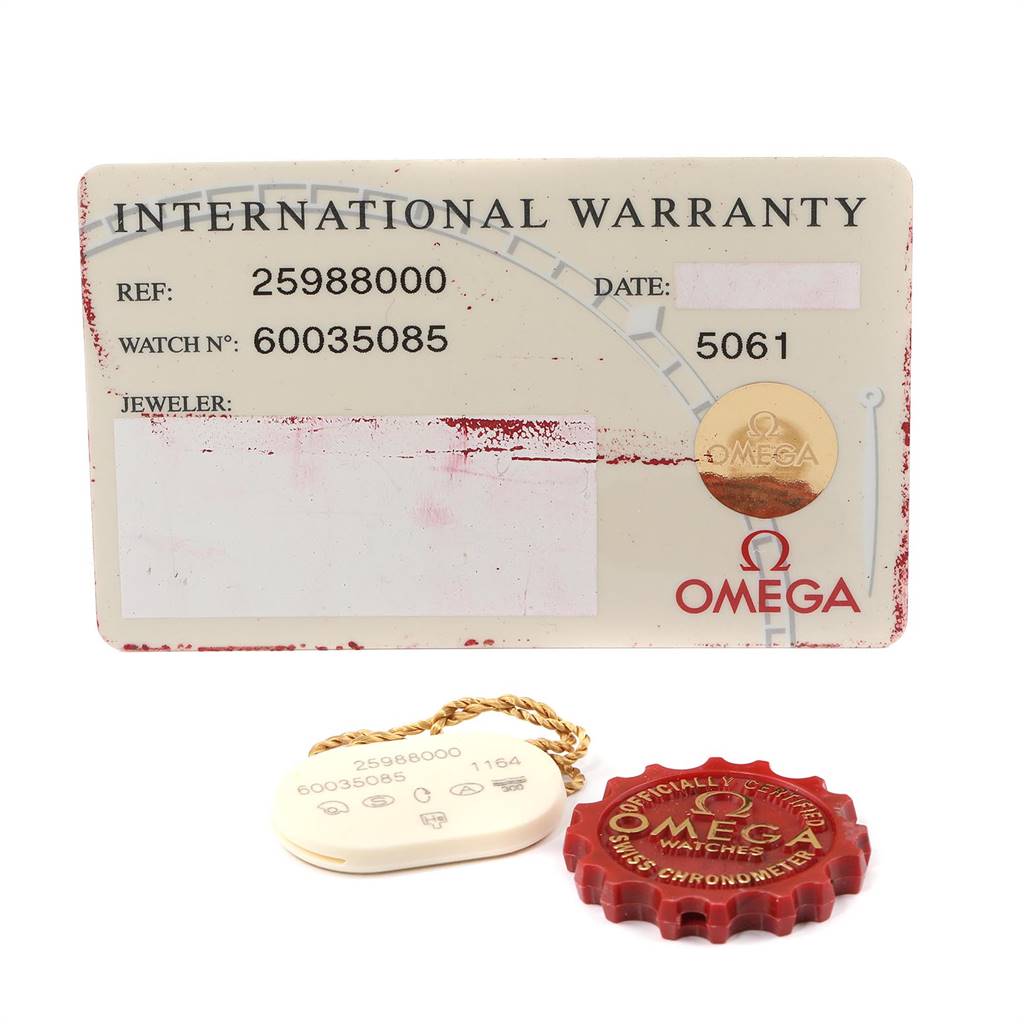 This image shows the warranty card and tags for an Omega Seamaster 2598.80.00 Men
s Stainless Steel Blue Dial 2598.80.00 Men
s Stainless Steel Blue Dial watch.