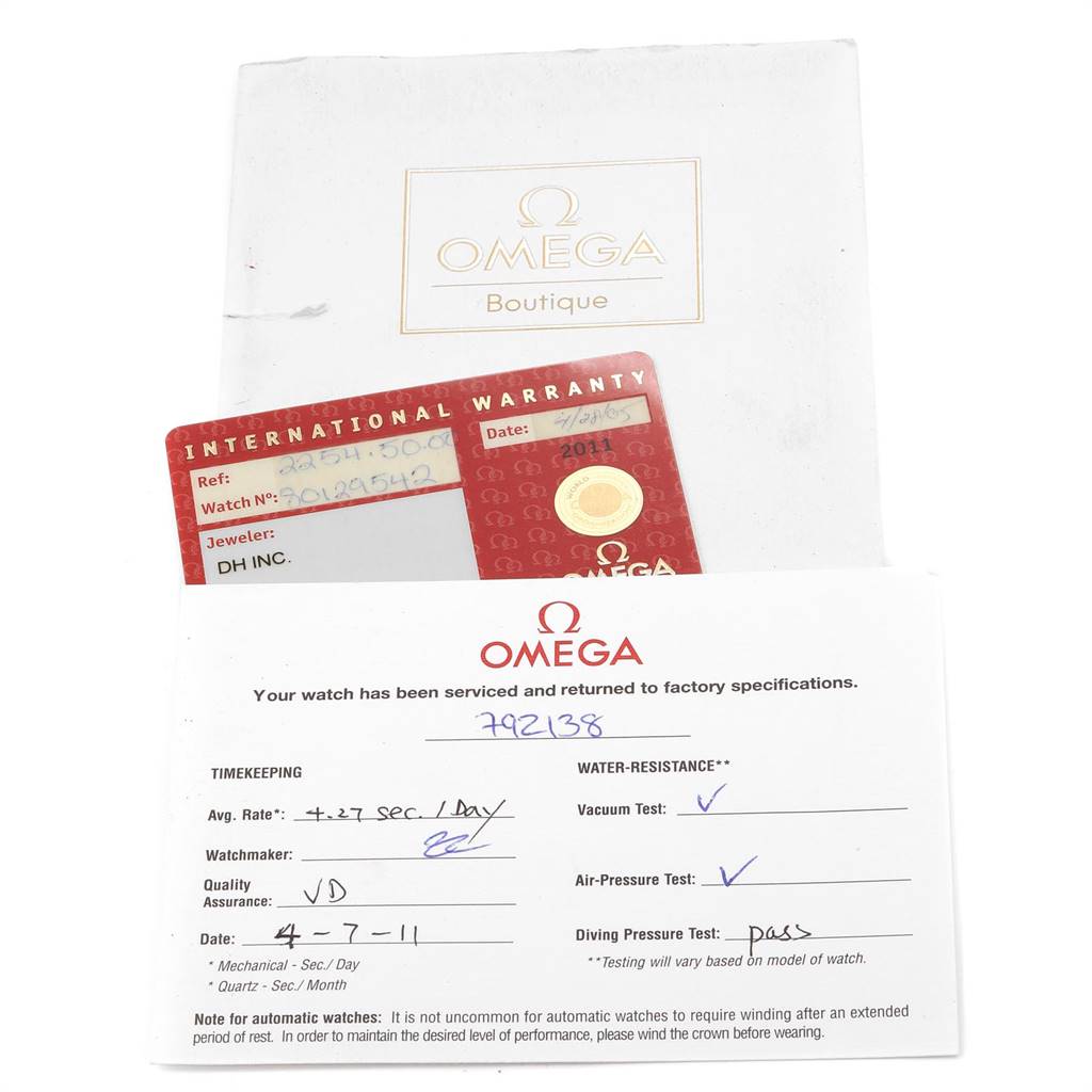 The image shows an Omega Seamaster 2254.50.00 Men
s Stainless Steel Black Dial 2254.50.00 Men
s Stainless Steel Black Dial watch
s international warranty card and a service document.