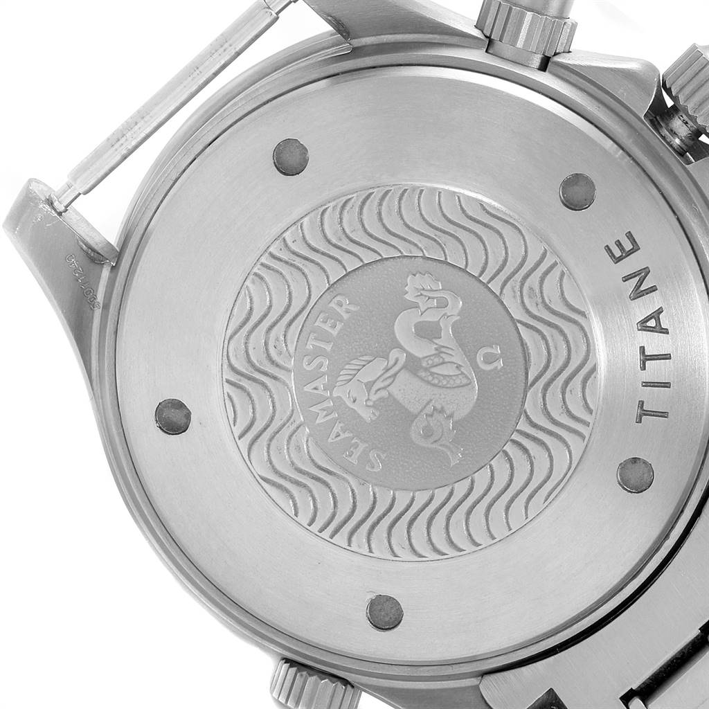 The image shows the back case of an Omega Seamaster 2298.80.00 Men
s Titanium Blue Dial 2298.80.00 Men
s Titanium Blue Dial watch, featuring a decorative engraving and the word "TITANE."