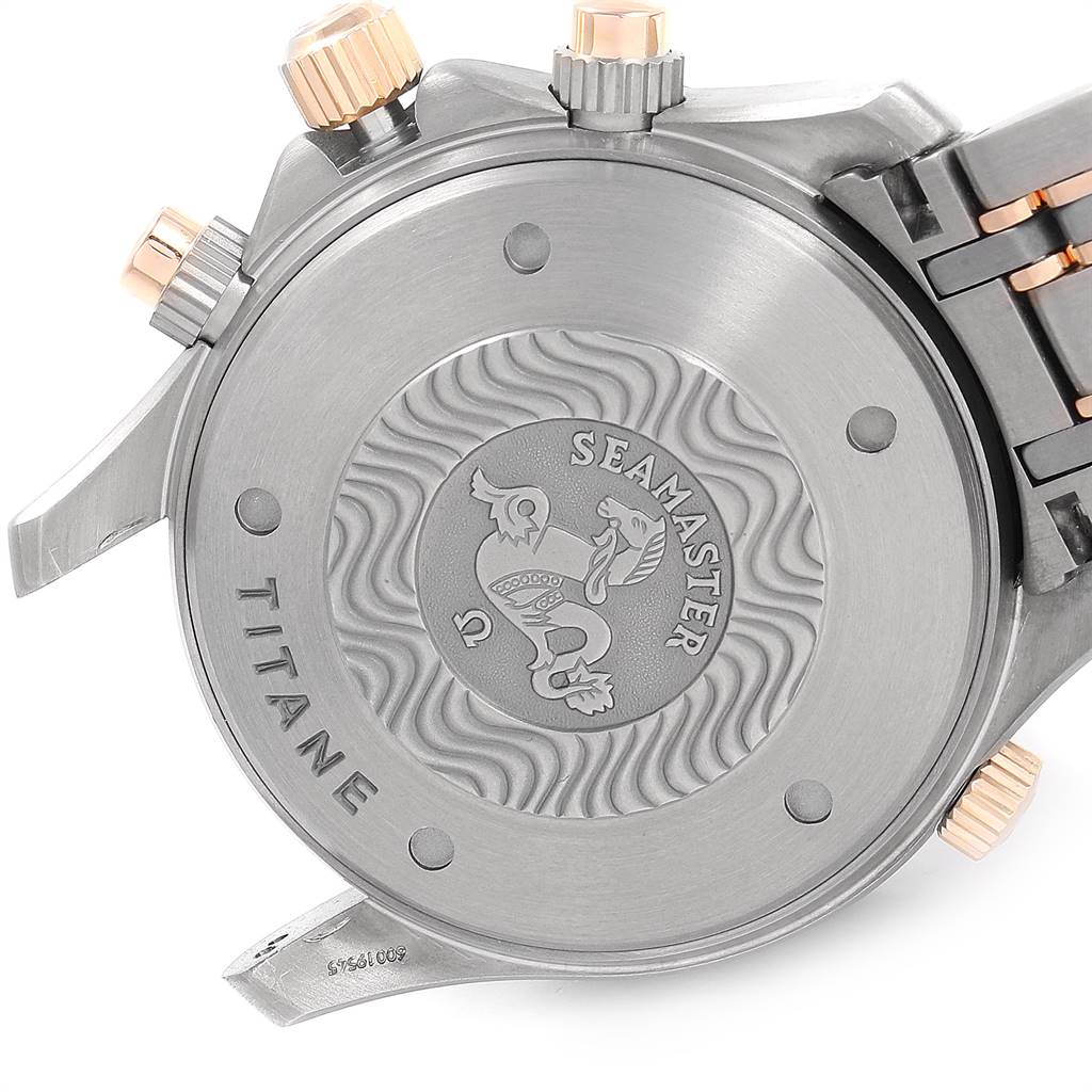 The image shows the back case of an Omega Seamaster 2296.80.00 Men
s Titanium Blue Dial 2296.80.00 Men
s Titanium Blue Dial watch, highlighting its intricate design and "Titane" engraving.