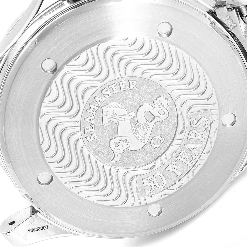 This image shows the back case of an Omega Seamaster 2234.50.00 Men
s Stainless Steel Black Dial 2234.50.00 Men
s Stainless Steel Black Dial watch, featuring engraved text and an emblem celebrating "50 Years."