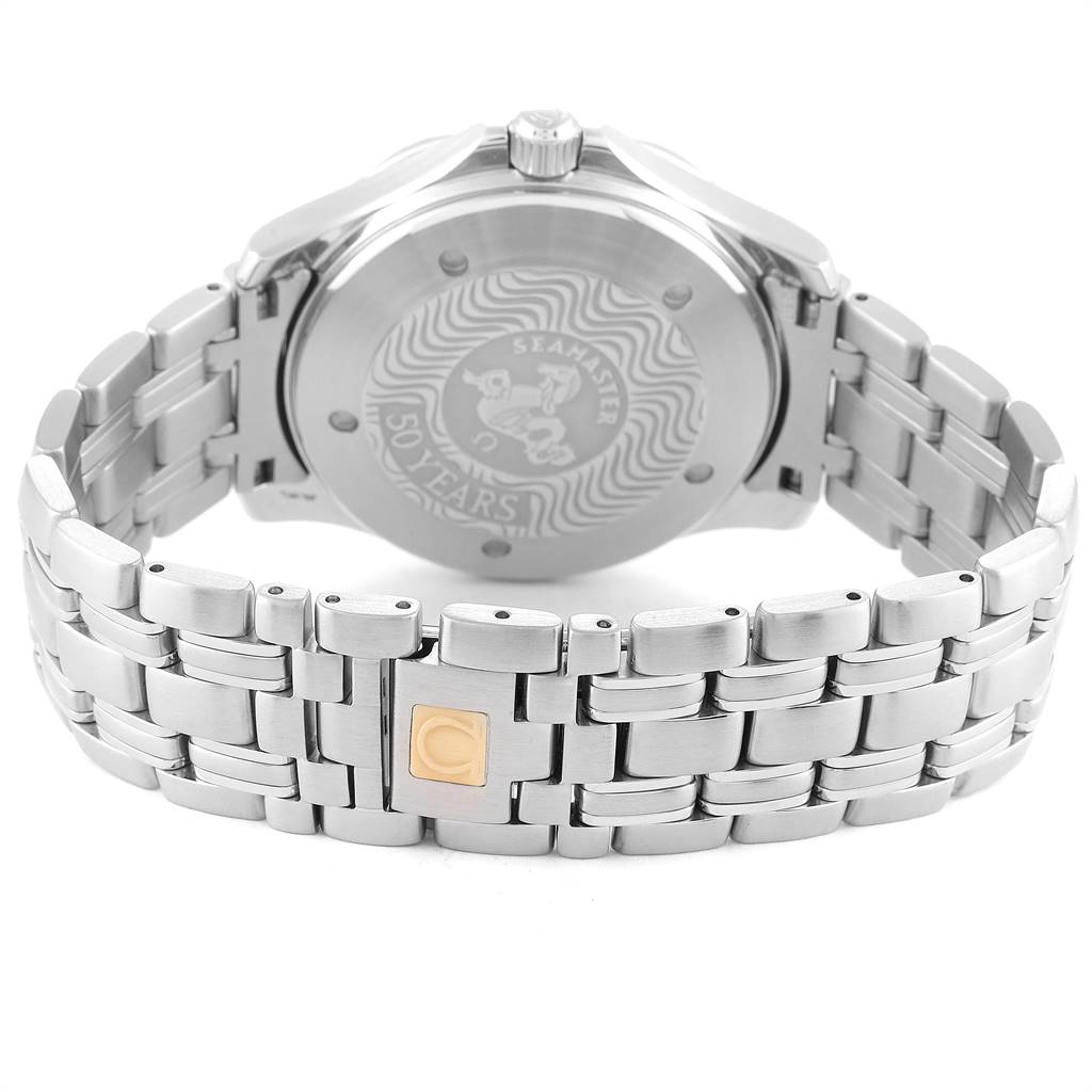 The image shows the back case and bracelet of the Omega Seamaster 2234.50.00 Men
s Stainless Steel Black Dial 2234.50.00 Men
s Stainless Steel Black Dial watch at an angle showcasing the detailed engraving and clasp.