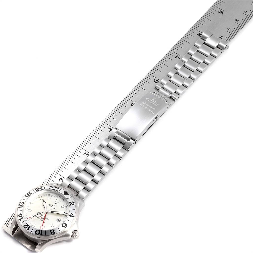 The image shows an Omega Seamaster 2538.20.00 Men's Stainless Steel White Dial 2538.20.00 Men's Stainless Steel White Dial watch placed next to a ruler, highlighting its metal bracelet and clasp.