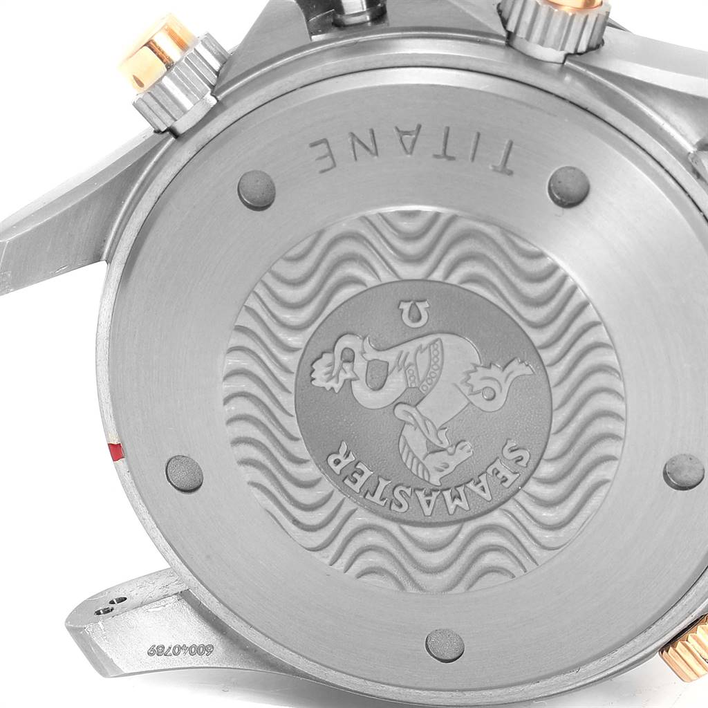 This is a close-up of the Omega Seamaster 2296.80.00 Men
s Titanium Blue Dial 2296.80.00 Men
s Titanium Blue Dial
s case back, showcasing engravings and the titanium material.