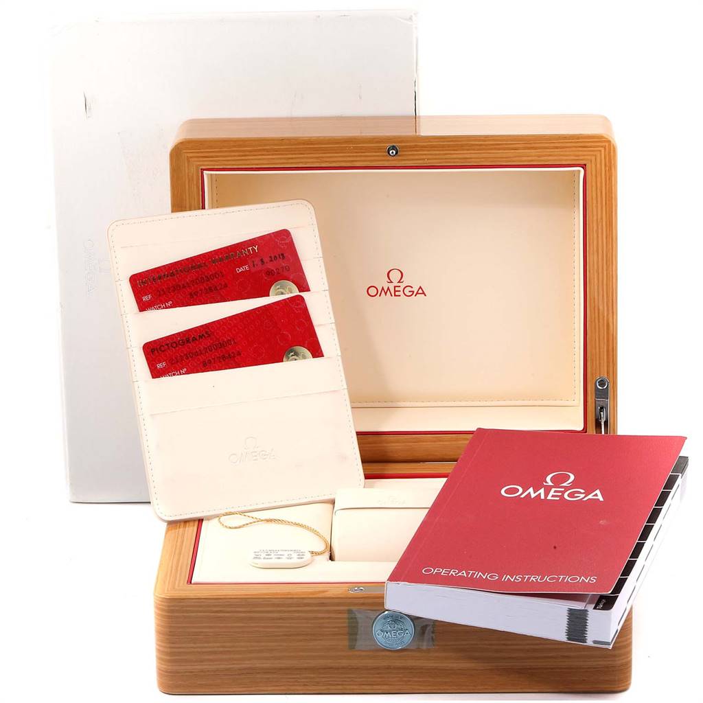 The image shows the packaging and accessories for an Omega Seamaster 212.30.41.20.03.001 Men
s Stainless Steel Blue Dial 212.30.41.20.03.001 Men
s Stainless Steel Blue Dial watch, including a box, warranty cards, and an operating manual.