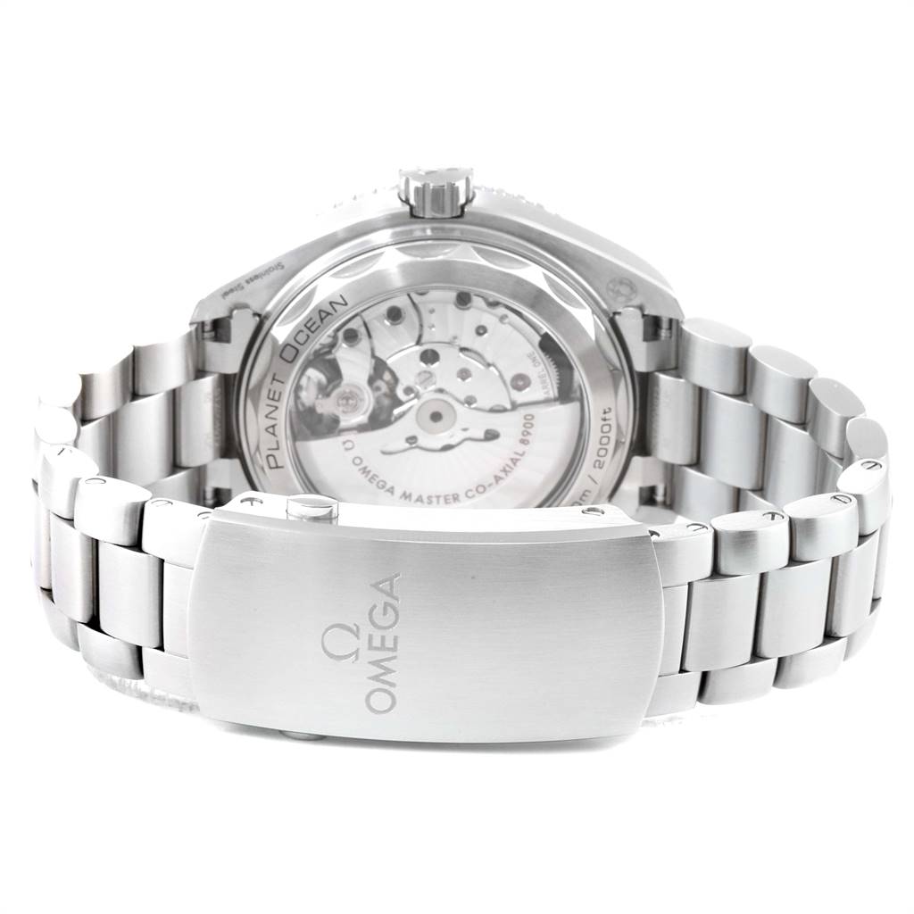 The image shows the back and clasp of the Omega Planet Ocean 215.30.44.21.01.001 Men
s Stainless Steel Black Dial 215.30.44.21.01.001 Men
s Stainless Steel Black Dial watch, highlighting its metal bracelet and the visible movement through the case back.