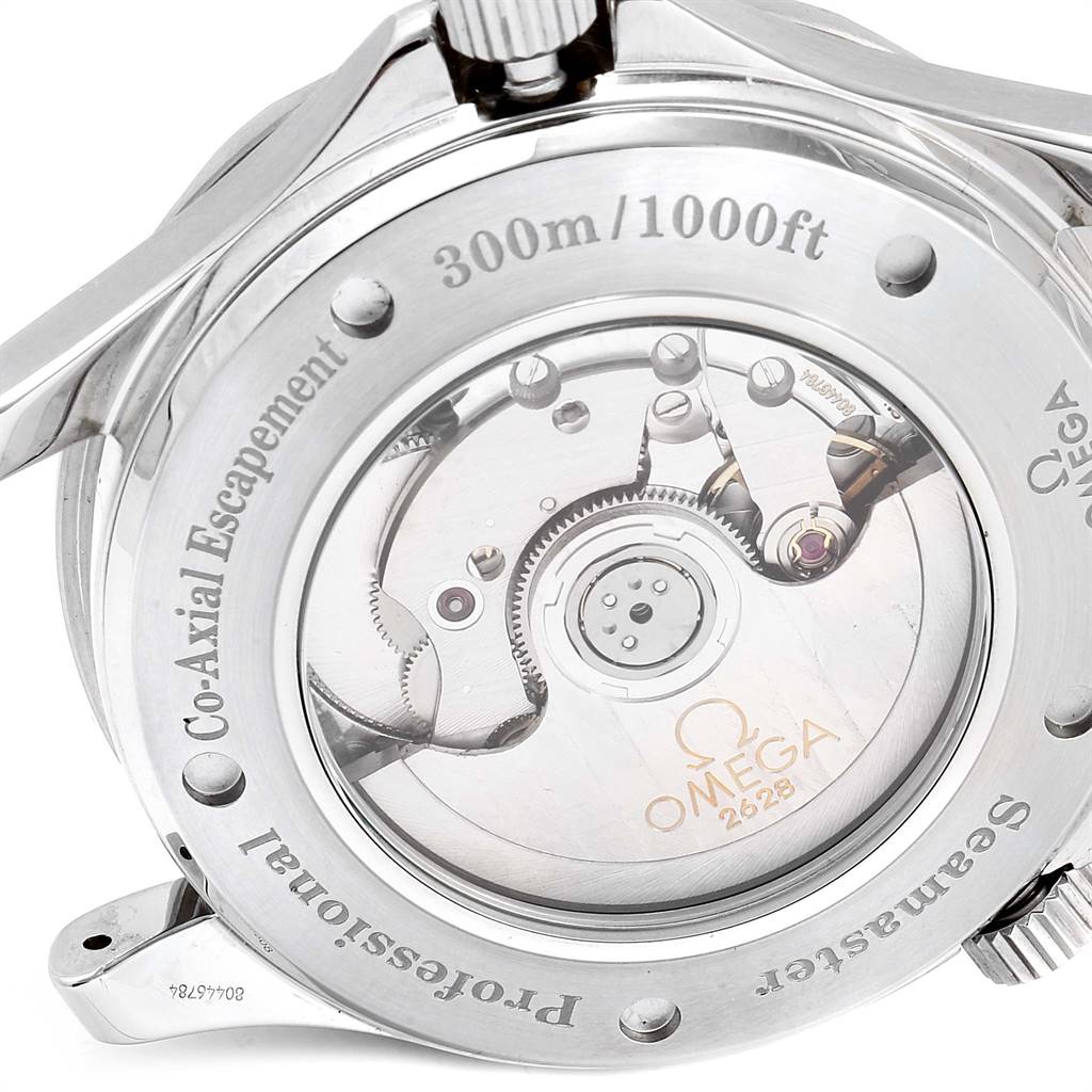 The image shows the case back of an Omega Seamaster 2535.80.00 Men
s Stainless Steel Blue Dial 2535.80.00 Men
s Stainless Steel Blue Dial watch, revealing its Co-Axial escapement and internal mechanisms.