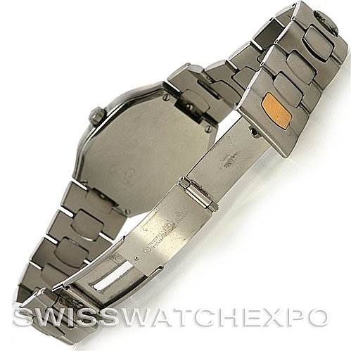 The image shows the backside and partially open bracelet of the Omega Seamaster Men's Steel and Gold (two tone) Black Dial Men's Steel and Gold (two tone) Black Dial watch, highlighting the clasp and the links.
