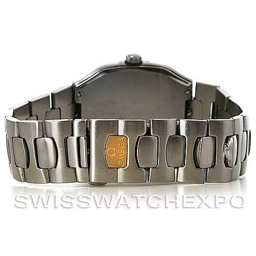 The image shows the rear view of an Omega Seamaster Men's Steel and Gold (two tone) Black Dial Men's Steel and Gold (two tone) Black Dial watch, focusing on the stainless steel bracelet and clasp with the Omega logo.