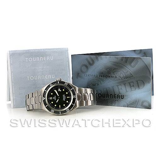 The image shows an Omega Seamaster 2810.50.00 Men
s Stainless Steel  2810.50.00 Men
s Stainless Steel  watch laid flat with its face and bracelet visible, accompanied by certification cards.