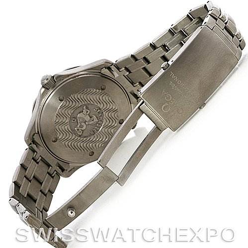 The image shows the back case and bracelet clasp of an Omega Seamaster 2232.80.00 Men's Titanium Blue Dial 2232.80.00 Men's Titanium Blue Dial watch, with the back case featuring a wavy pattern and the Omega logo.