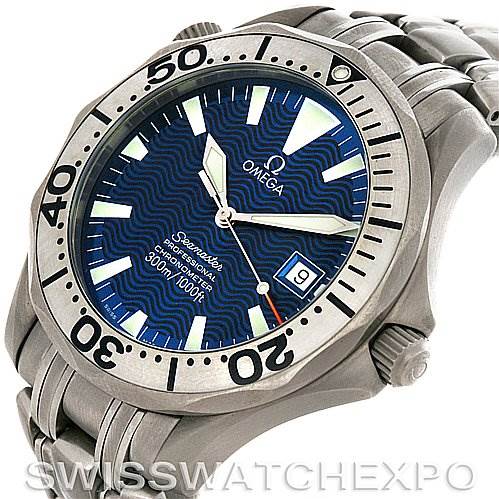 The image shows an Omega Seamaster 2231.80.00 Men
s Stainless Steel Blue Dial 2231.80.00 Men
s Stainless Steel Blue Dial watch at an angled view, displaying its bezel, dial, hands, crown, and part of the stainless steel bracelet.
