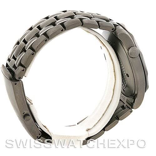 The image shows a side view of the Omega Seamaster 2231.80.00 Men
s Stainless Steel Blue Dial 2231.80.00 Men
s Stainless Steel Blue Dial watch, highlighting the crown and stainless steel bracelet.