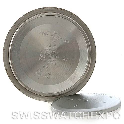 The image shows the inside and outside of the case back of an Omega Seamaster 2534.50 Men
s Stainless Steel Black Dial 2534.50 Men
s Stainless Steel Black Dial watch.