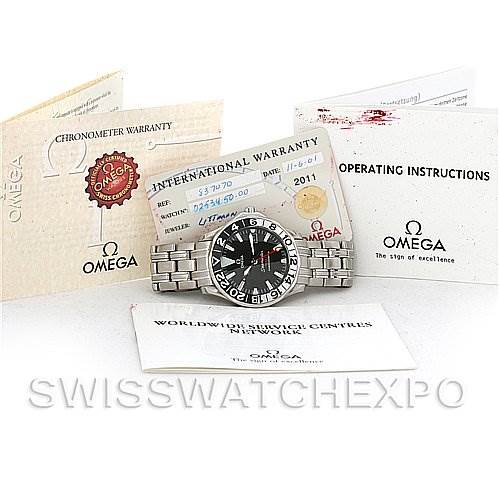 The image shows the Omega Seamaster 2534.50 Men
s Stainless Steel Black Dial 2534.50 Men
s Stainless Steel Black Dial watch at a straight-on angle, accompanied by warranty cards and operating instructions.