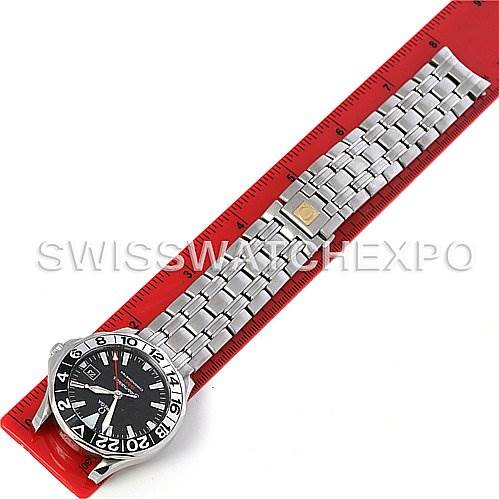 The Omega Seamaster 2534.50 Men
s Stainless Steel Black Dial 2534.50 Men
s Stainless Steel Black Dial watch is shown from a top-down angle, displaying its face, bezel, and metal bracelet partly measured by a ruler.