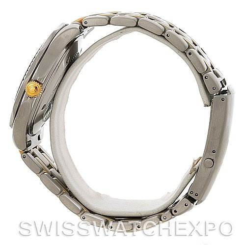 The image shows a side view of an Omega Seamaster Men's Steel and Gold (two tone) White Dial Men's Steel and Gold (two tone) White Dial watch, highlighting its bracelet and crown.