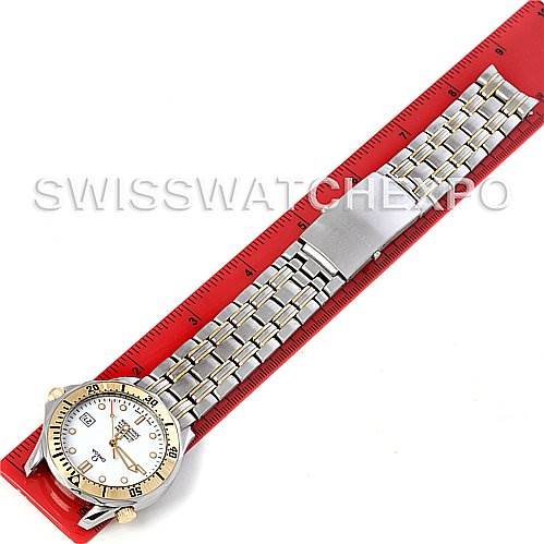 The image shows an Omega Seamaster Men's Steel and Gold (two tone) White Dial Men's Steel and Gold (two tone) White Dial watch from a top-down angle, highlighting the face, bezel, and metal bracelet.