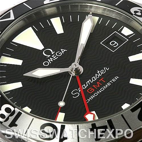 Close-up of the Omega Seamaster 2534.50 Men
s Stainless Steel Black Dial 2534.50 Men
s Stainless Steel Black Dial GMT watch face, showing hands, date display, and some of the bezel.