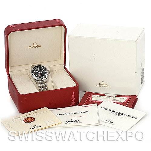 The image shows an Omega Seamaster 2534.50 Men
s Stainless Steel Black Dial 2534.50 Men
s Stainless Steel Black Dial watch in its open red case, with accompanying documents and an outer white box.