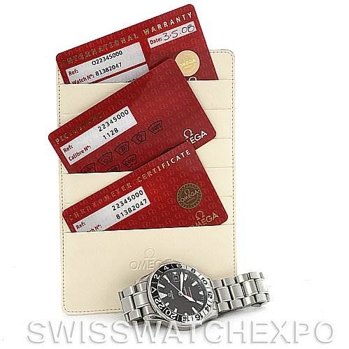 The image shows an Omega Seamaster 2534.50 Men
s Stainless Steel Black Dial 2534.50 Men
s Stainless Steel Black Dial watch and warranty cards, laid out flat, with the watch displaying its face and bracelet.