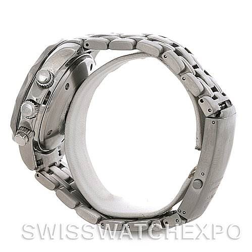 The image shows a side view of an Omega Seamaster 2598.20.00 Men's Stainless Steel White Dial 2598.20.00 Men's Stainless Steel White Dial watch emphasizing its case, crown, pushers, and metal bracelet.