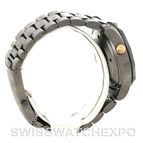 The image shows the side view of the Seamaster Omega watch, highlighting its metal bracelet and crown.