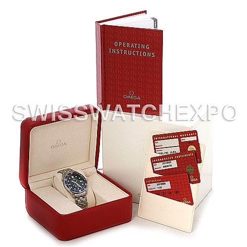 The image shows an Omega Seamaster 2531.80 Men
s Stainless Steel Blue Dial 2531.80 Men
s Stainless Steel Blue Dial watch in its case, accompanied by an operating manual and warranty cards.