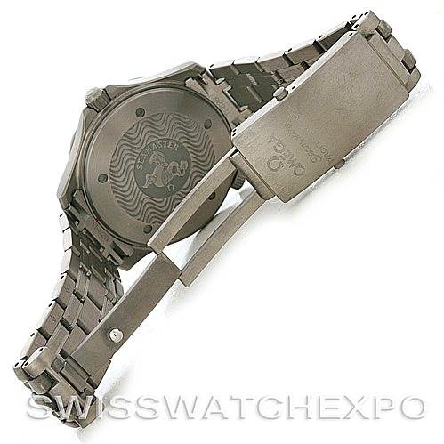 This image shows the case back and partially open clasp of an Omega Seamaster 2232.80.00 Men
s Titanium Blue Dial 2232.80.00 Men
s Titanium Blue Dial watch, highlighting its bracelet and engravings.