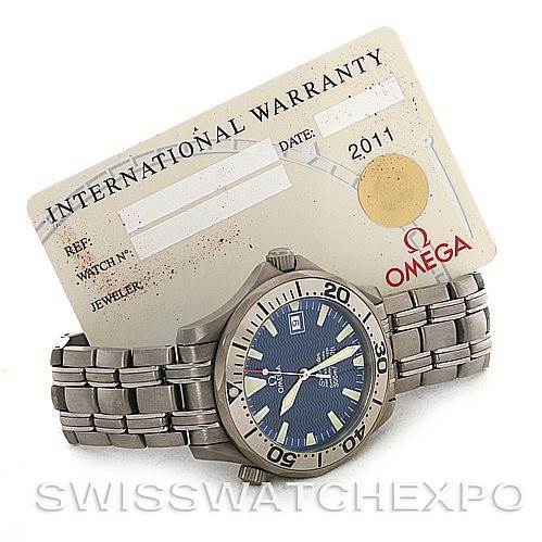 The image shows an Omega Seamaster 2232.80.00 Men
s Titanium Blue Dial 2232.80.00 Men
s Titanium Blue Dial watch from the front, displaying its face and metal bracelet, alongside an international warranty card.