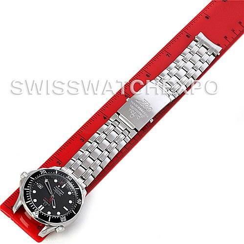 The image shows an Omega Seamaster 212.30.41.20.01.001 Men's Stainless Steel Black Dial 212.30.41.20.01.001 Men's Stainless Steel Black Dial watch and its stainless steel bracelet laid out flat next to a red ruler.