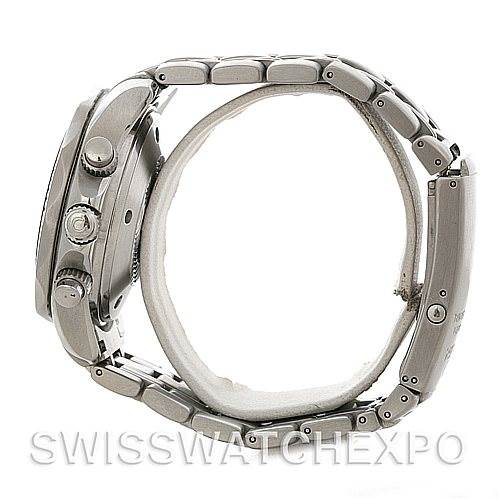 The Omega Seamaster 2598.80.00 Men
s Stainless Steel Blue Dial 2598.80.00 Men
s Stainless Steel Blue Dial watch is shown from a side angle, highlighting its crown, pushers, and metal bracelet.